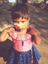 Cute girl holding ice cream