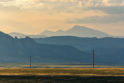 Scenic view of mountains against sky during sunset