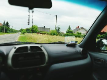 Road seen through car windshield