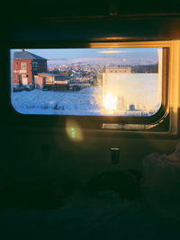 View of train in city at night