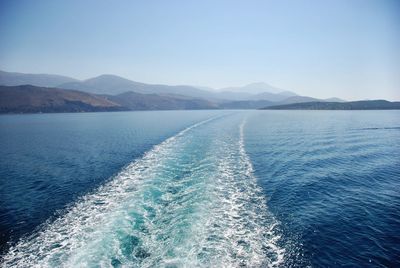 Scenic view of sea against clear blue sky