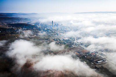 High angle view of cars on landscape against sky
