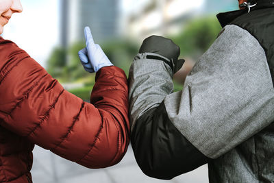 Close-up of man holding hands