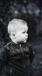 Boy wearing leather jacket