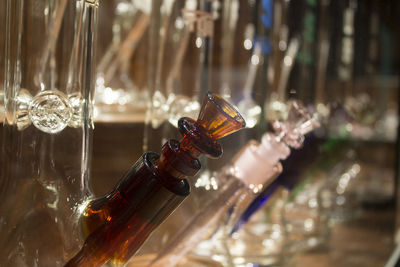 Close-up of glass bongs