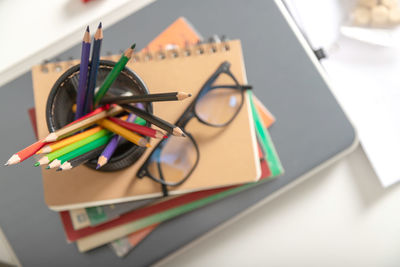 High angle view of multi colored pencils on table