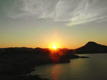 View of calm sea at sunset