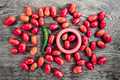 High angle view of fruits and chili pepper on table