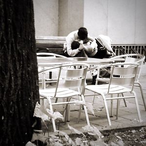 Couple sitting on table