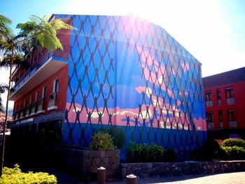 Low angle view of building against blue sky