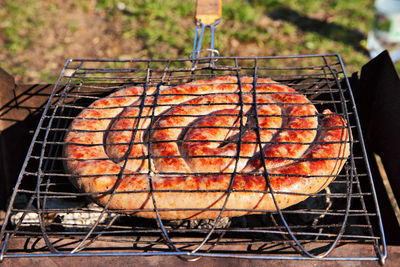 Close-up of meat on barbecue grill