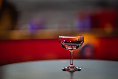 Close-up of wine glass on table