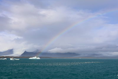 Rainbow over glacier lagoon