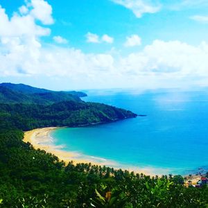 Scenic view of sea against cloudy sky