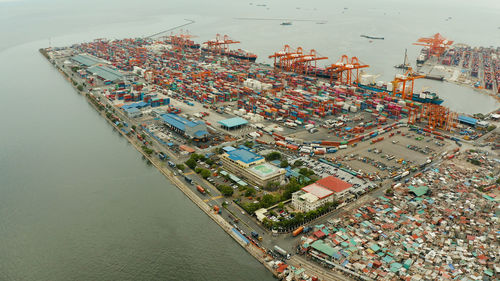 High angle view of commercial dock by sea
