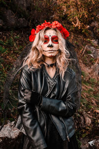 Closeup portrait of calavera catrina. young woman with sugar skull makeup. dia de los muertos. day 