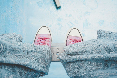 Low section of shoes on water