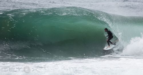 Man surfing in sea