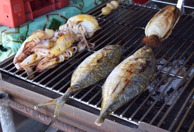 High angle view of fresh seafood on barbecue grill