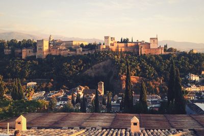 Distant view of alhambra against sky