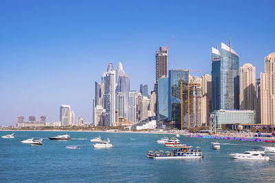 Beautiful modern residential buildings with beach in foreground