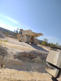 Built structure on road against clear blue sky