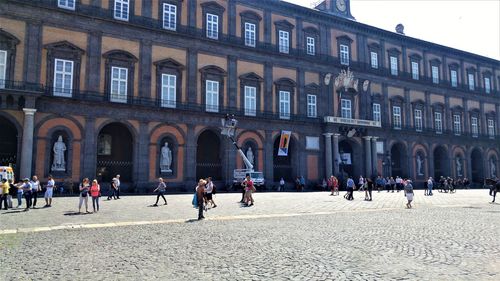 Group of people in front of building