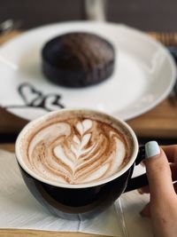 Coffee cup on table