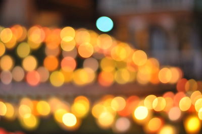 Defocused image of illuminated lights at night