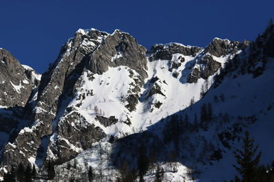 Scenic view of snow covered mountains