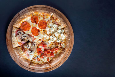 High angle view of pizza in glass on table