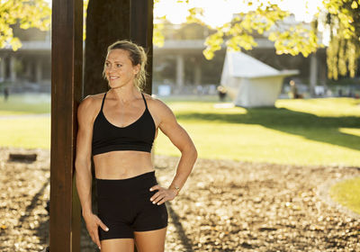 Smiling woman wearing fitness clothes