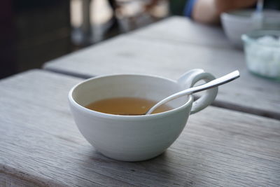 Close-up of tea cup on table