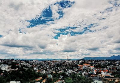 High angle shot of townscape against sky