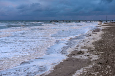 Scenic view of beach against sky