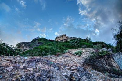 Low angle view of hill against clear sky