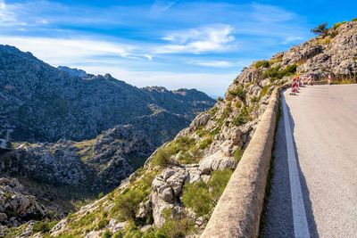 Panoramic view of road amidst mountains against sky