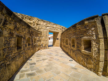 Old building against blue sky
