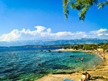 Scenic view of sea against blue sky