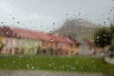 Close-up of water drops on glass