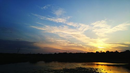 Scenic view of sea at sunset