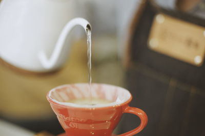 Close-up of coffee cup on table