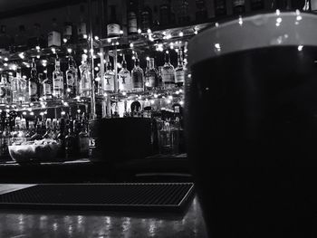 Close-up of wine glass on bar counter