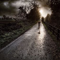 Full length of woman walking on road