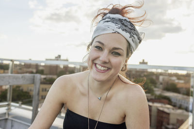 Portrait of a young woman wearing sunglasses