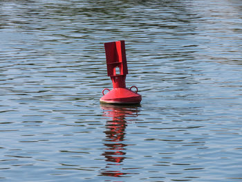 Red floating on water