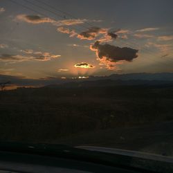 Scenic view of landscape at sunset