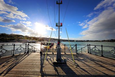 Pier on sea against sky