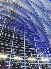 Low angle view of illuminated building at night