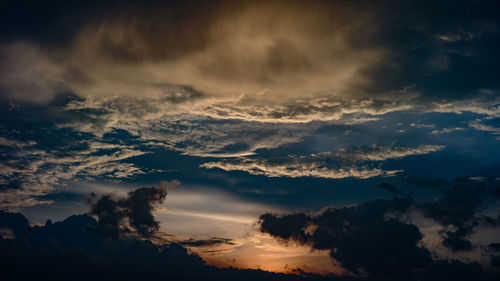 Low angle view of dramatic sky during sunset